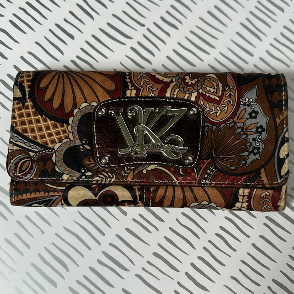 Kathy Van Zealand brown/multicolored 3 fold wallet. 11 slots for c/c & 1 ID slot